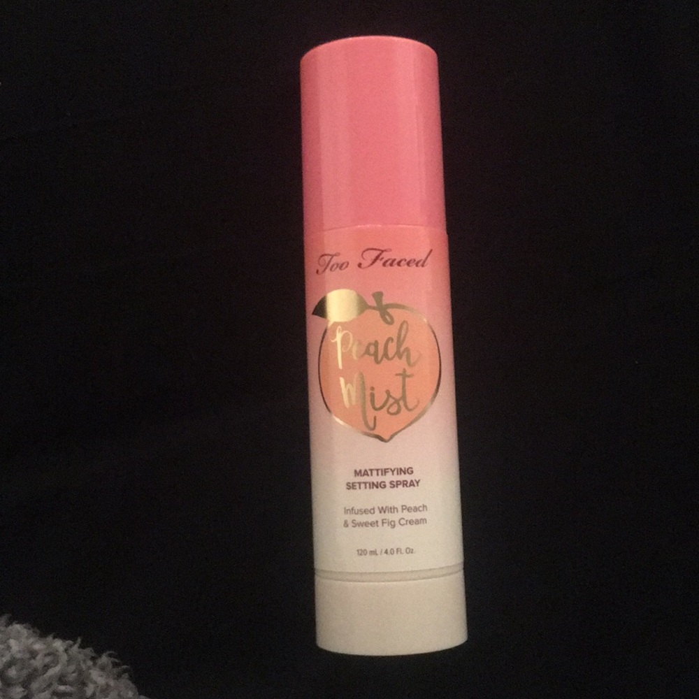 Two faced setting spray